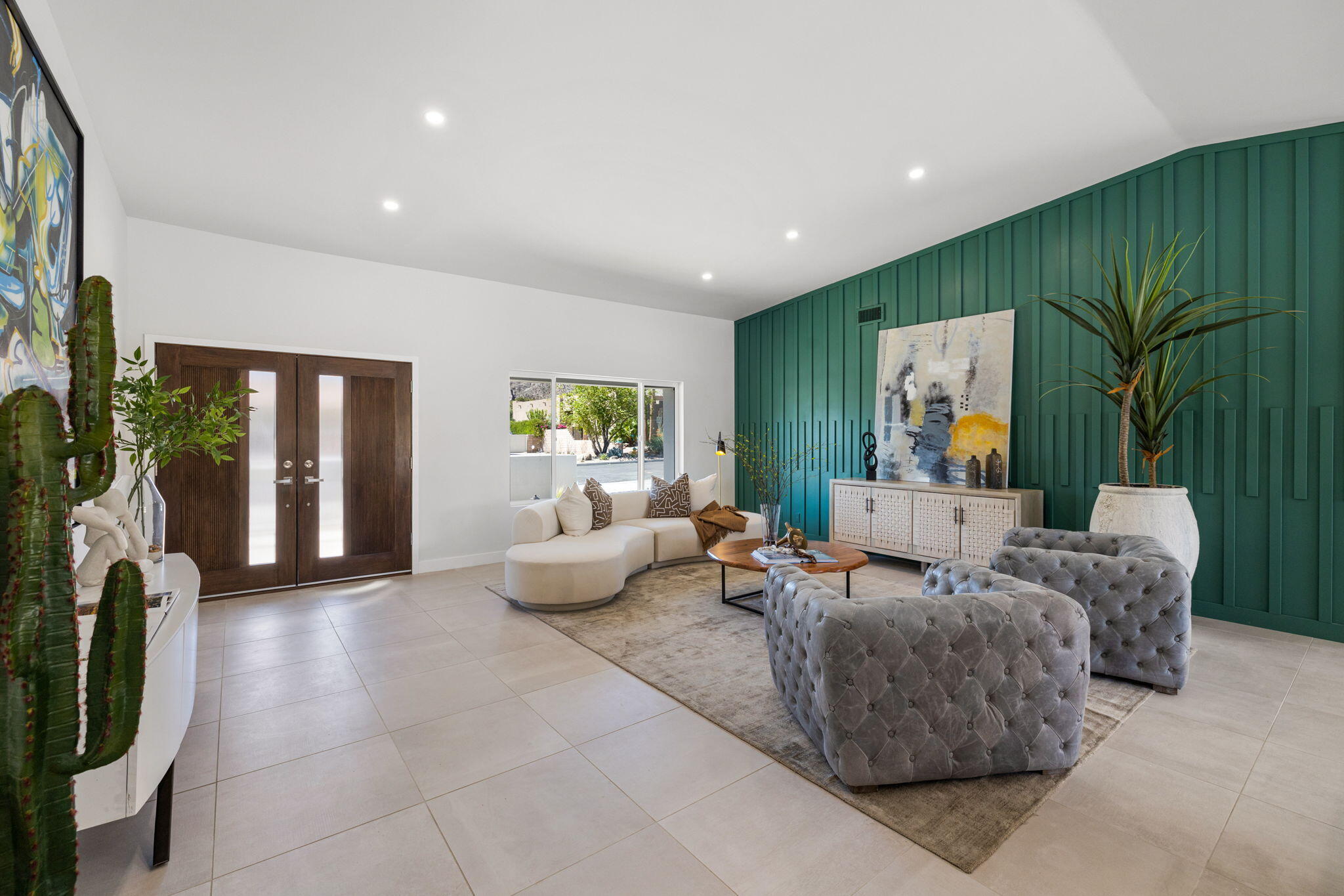 72278 Barbara Drive Rancho Mirage, CA 92270 - Photo 59 of 69 a living room with furniture and a large window