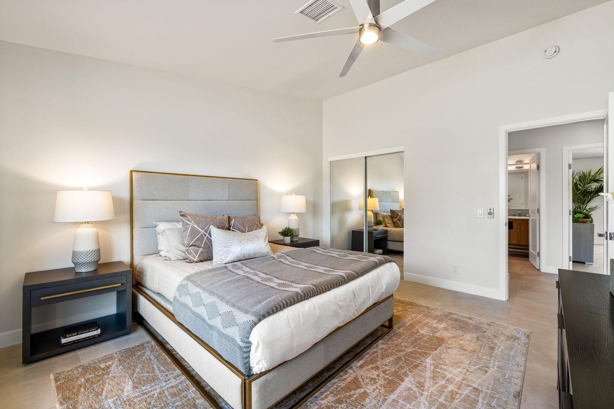 72278 Barbara Drive Rancho Mirage, CA 92270 - Photo 60 of 69 a bedroom with a bed and lamp on dresser
