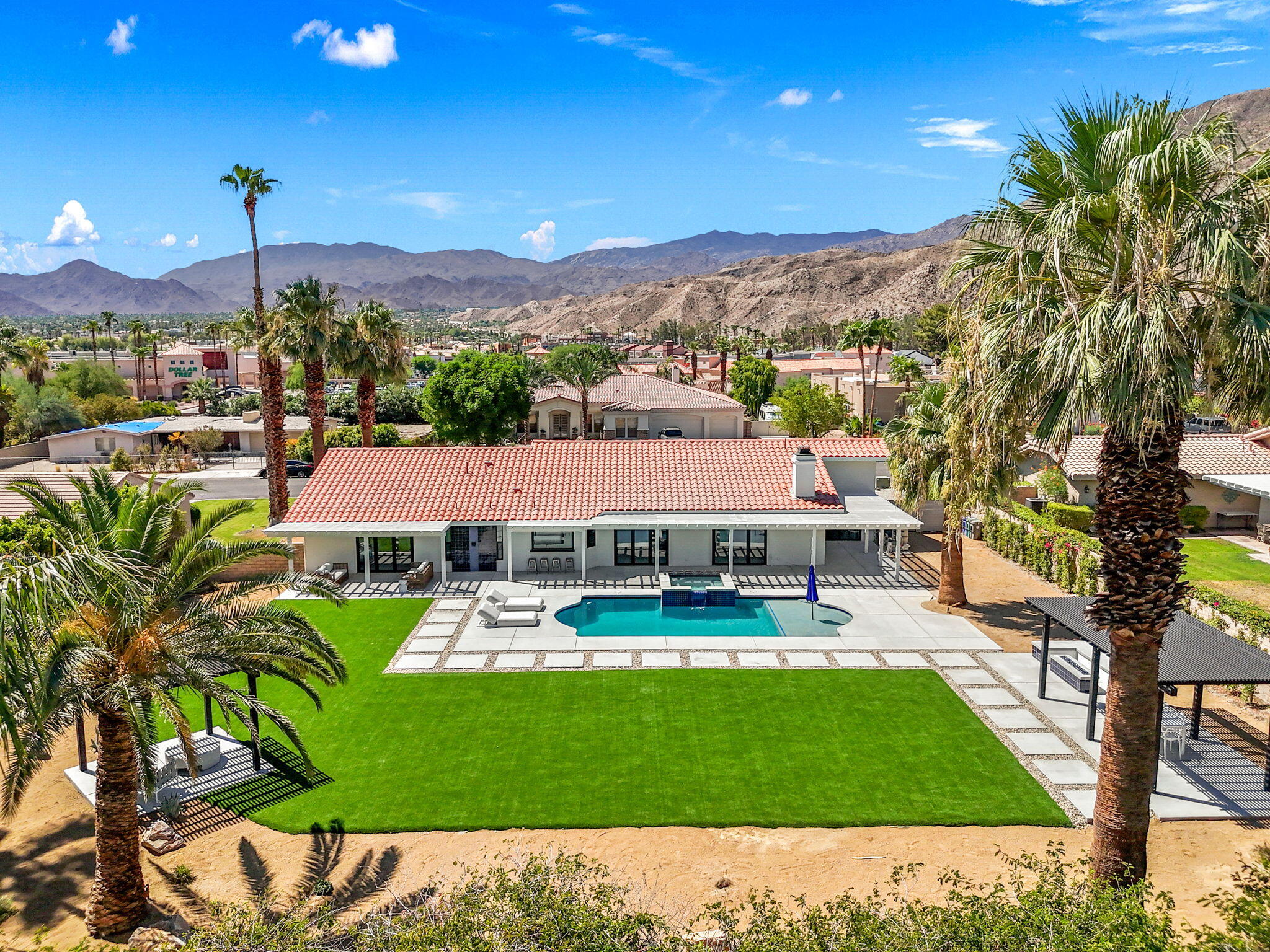 72278 Barbara Drive Rancho Mirage, CA 92270 - Photo 6 of 69 a aerial view of a house with garden space and street view
