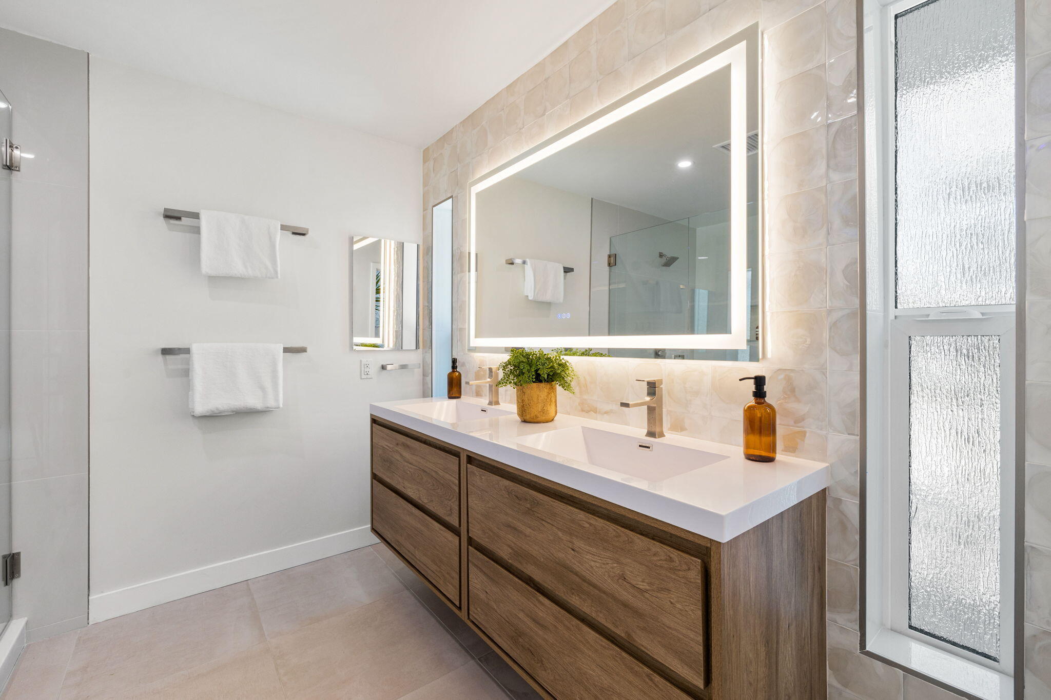 72278 Barbara Drive Rancho Mirage, CA 92270 - Photo 63 of 69 a bathroom with a sink and a mirror