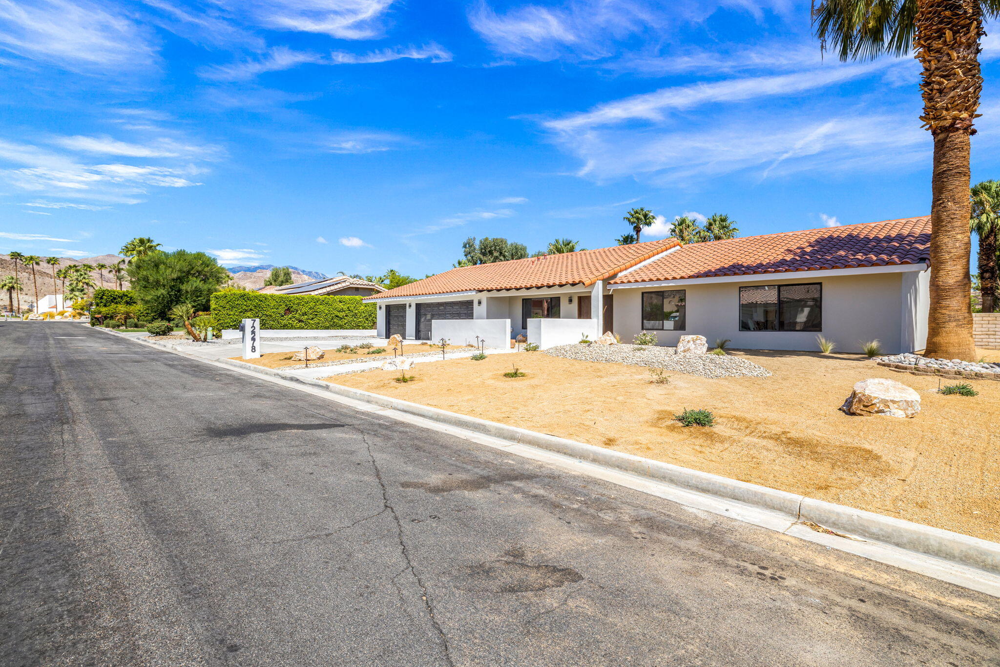 72278 Barbara Drive Rancho Mirage, CA 92270 - Photo 8 of 69 a view of a house with a swimming pool