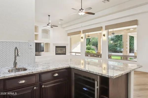 a kitchen with granite countertop a sink and a granite counter tops