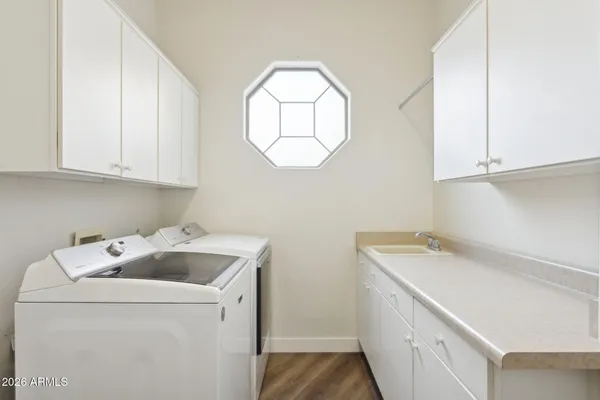 a utility room with dryer and washer
