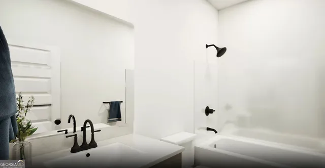a bathroom with a tub sink and mirror