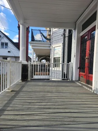a view of a house with a porch