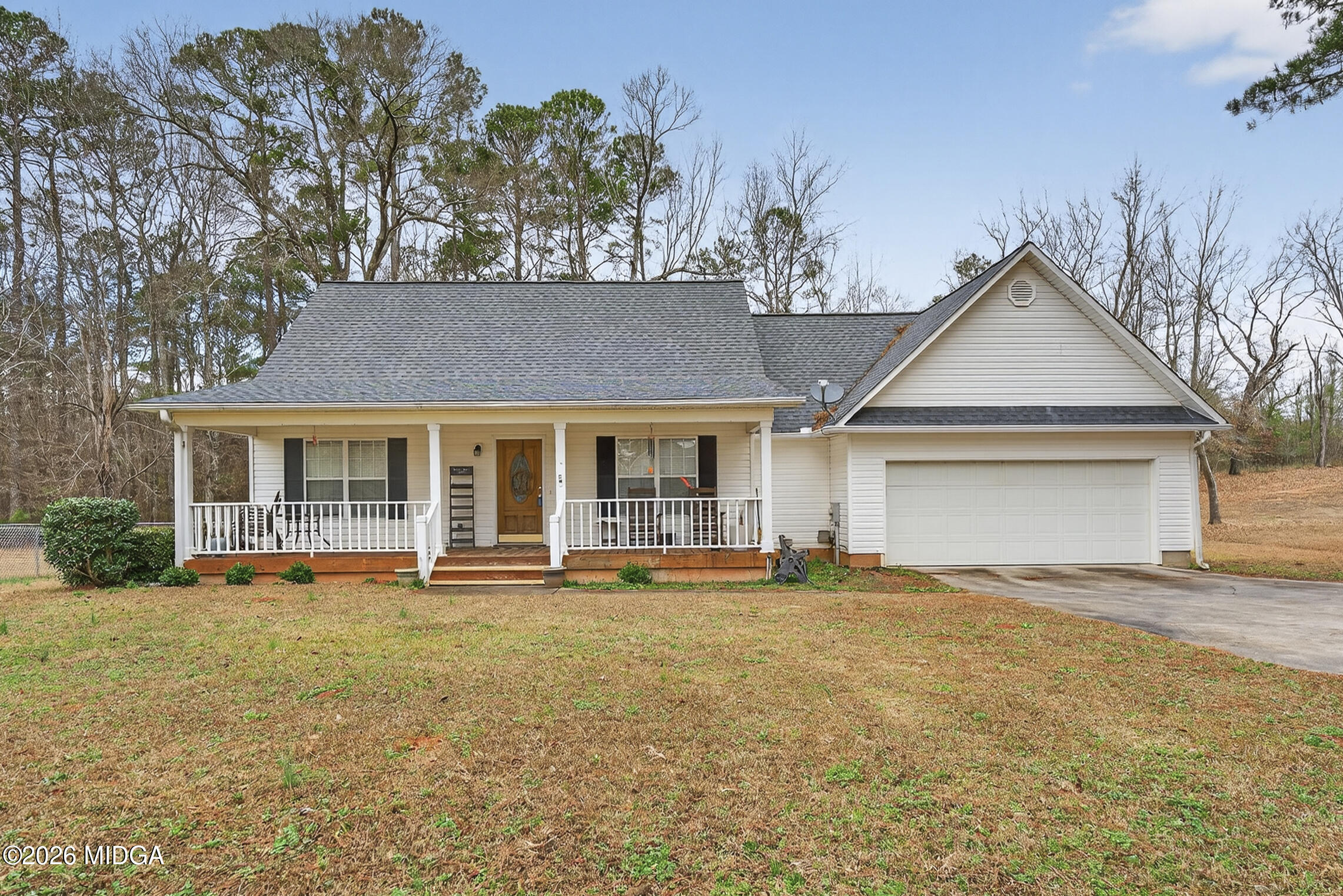 front view of a house with a yard