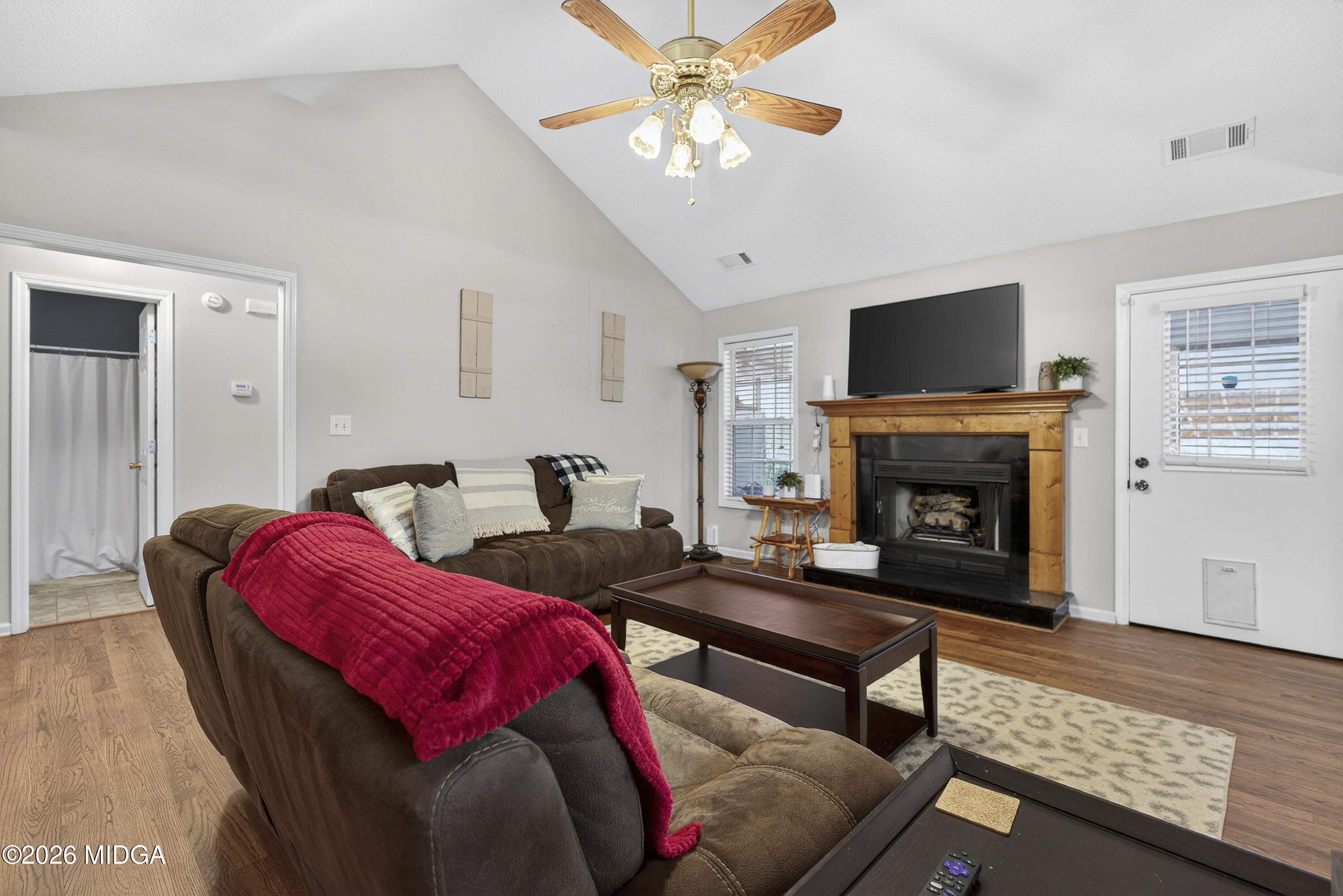 249 Southern Walk Circle Gray, GA 31032 - Photo 15 of 58 a living room with furniture and a fireplace