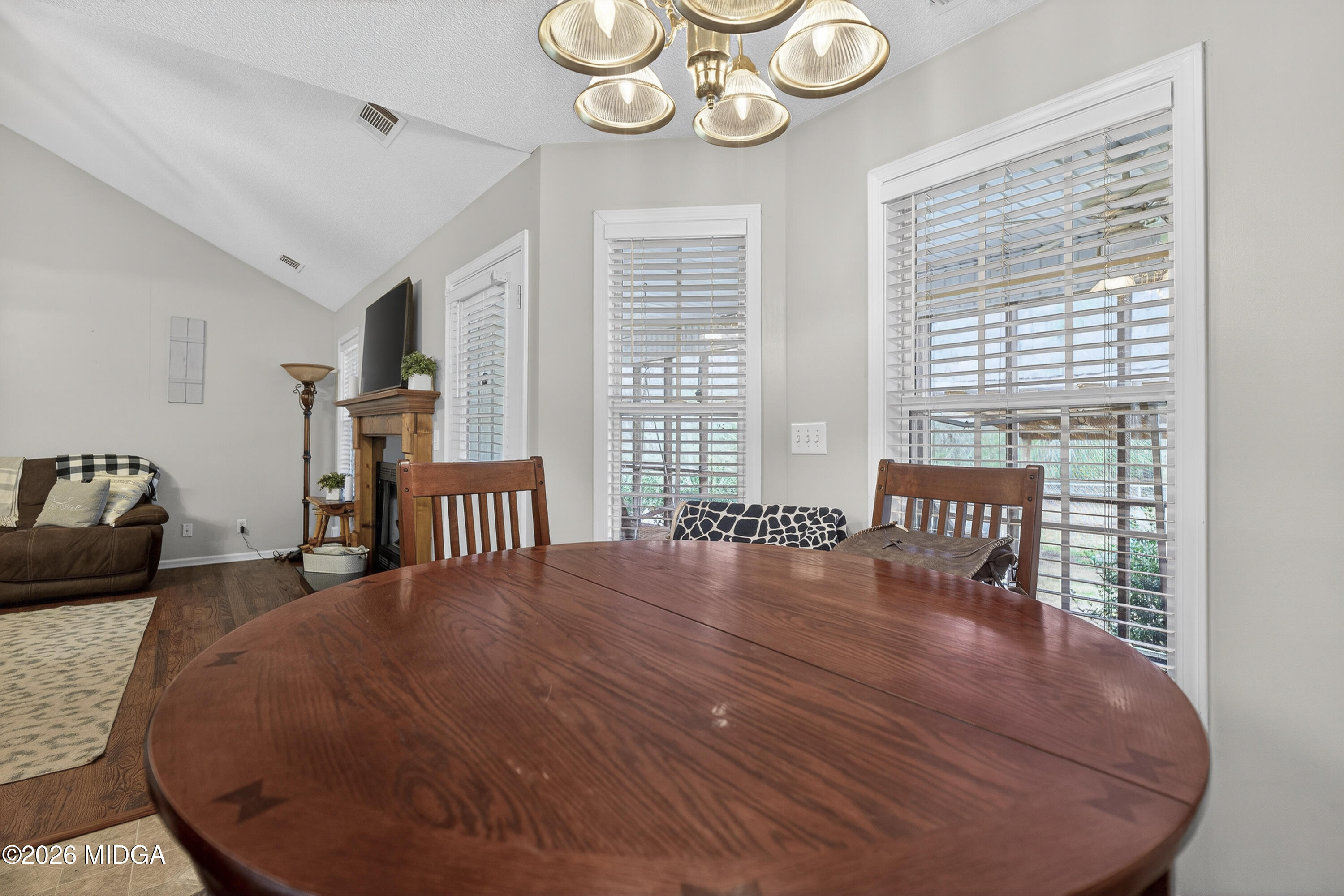 249 Southern Walk Circle Gray, GA 31032 - Photo 20 of 58 a large bedroom with a bed and a large window