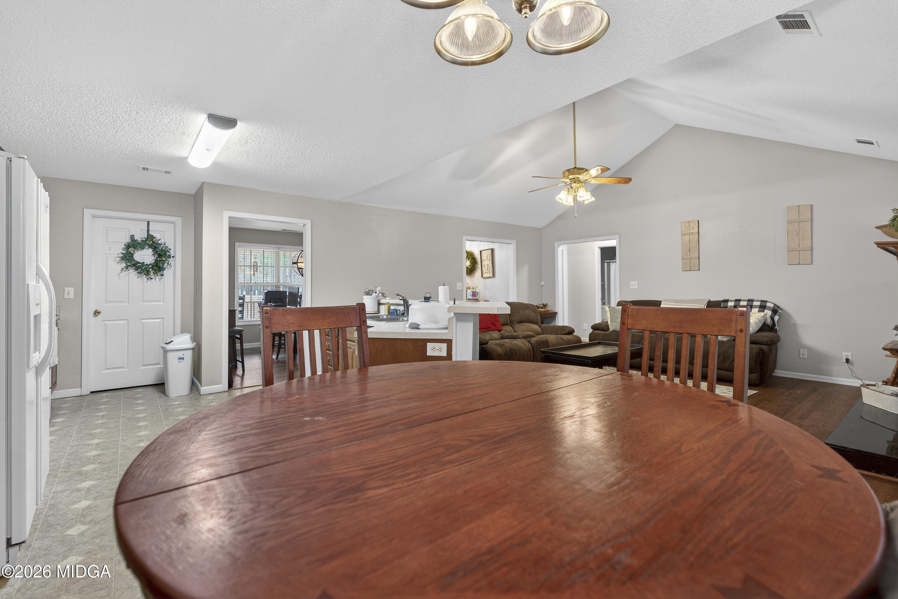 249 Southern Walk Circle Gray, GA 31032 - Photo 23 of 58 a living room with furniture and wooden floor