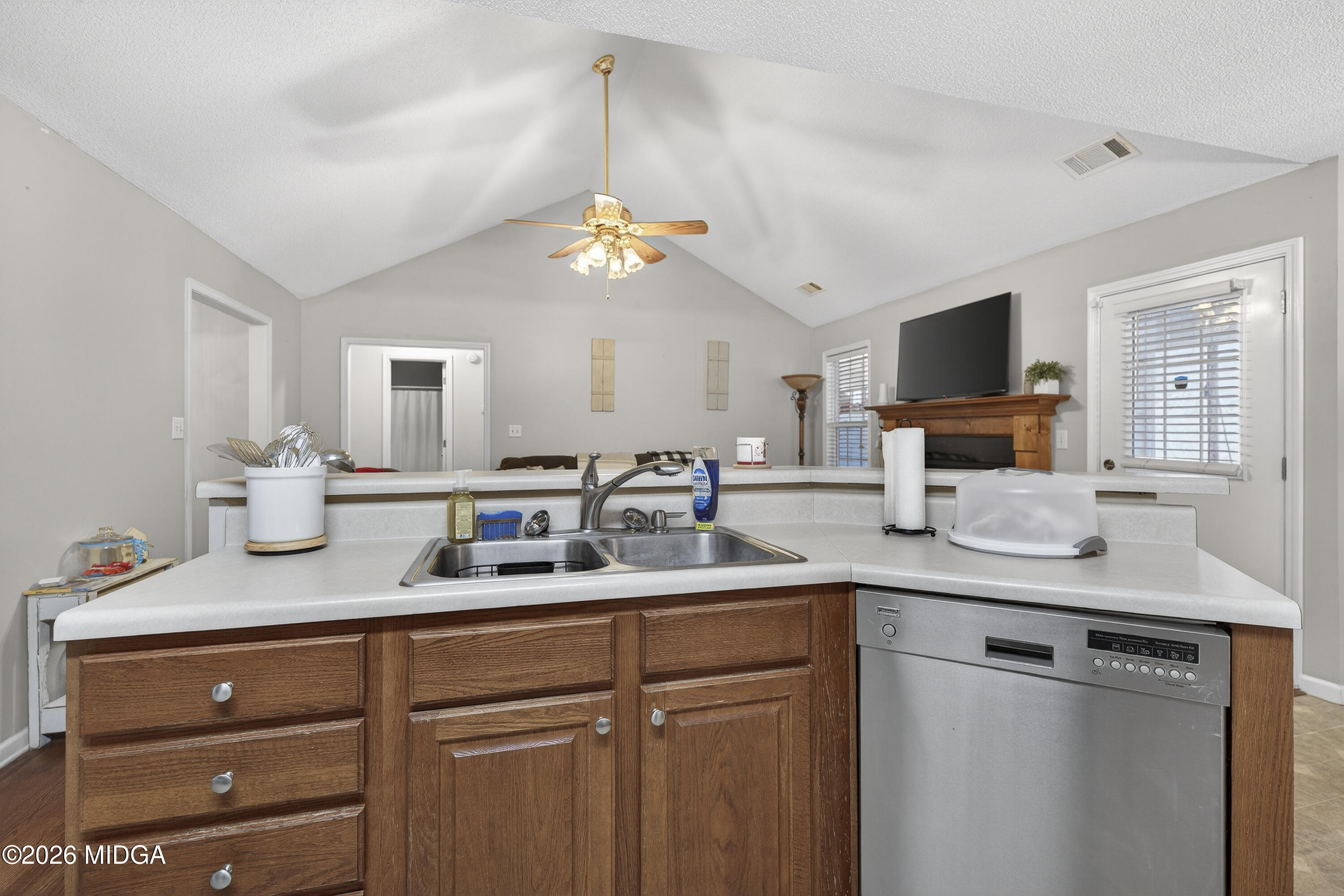 249 Southern Walk Circle Gray, GA 31032 - Photo 24 of 58 a kitchen with cabinets appliances and a sink