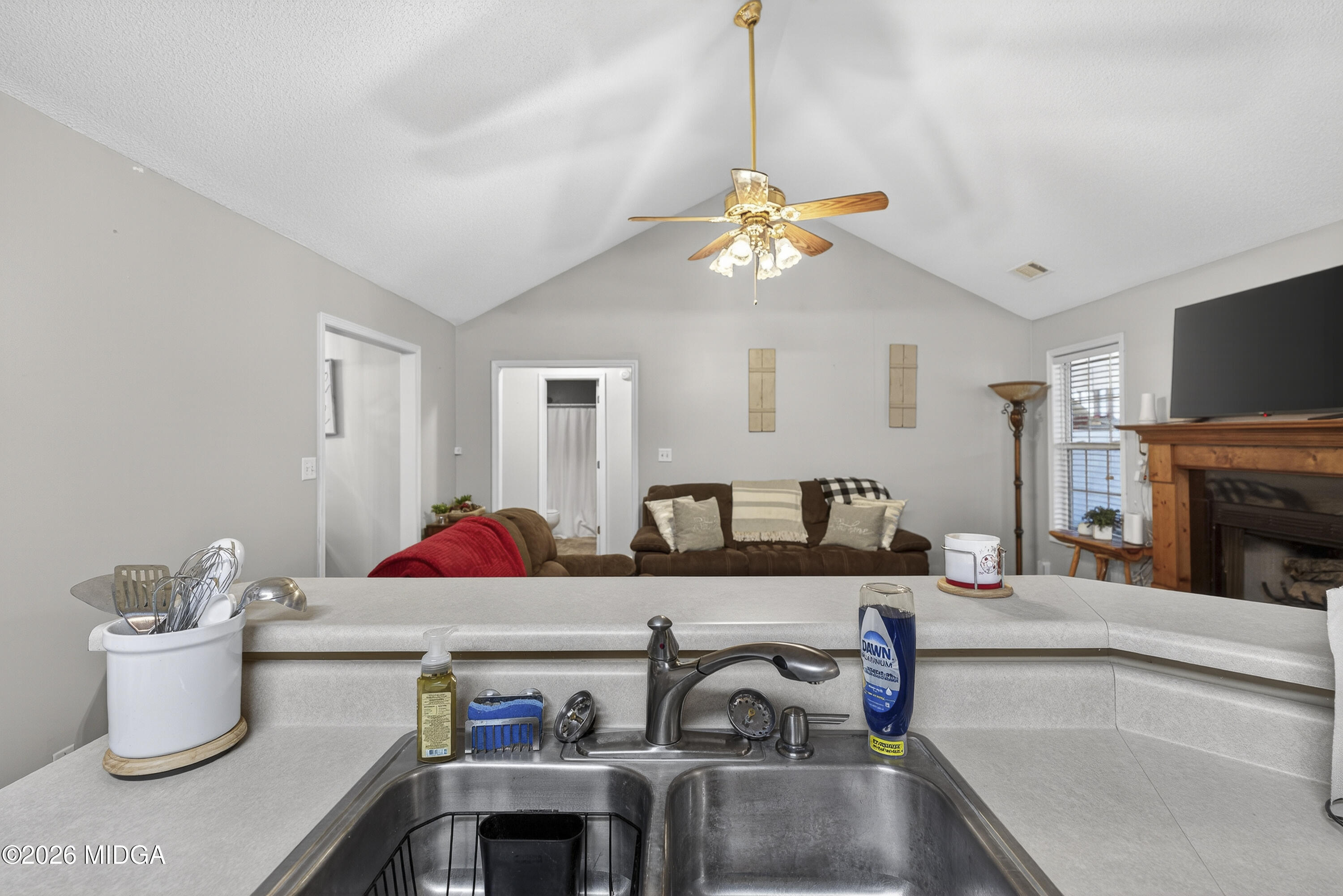 249 Southern Walk Circle Gray, GA 31032 - Photo 29 of 58 a living room with furniture and a fireplace