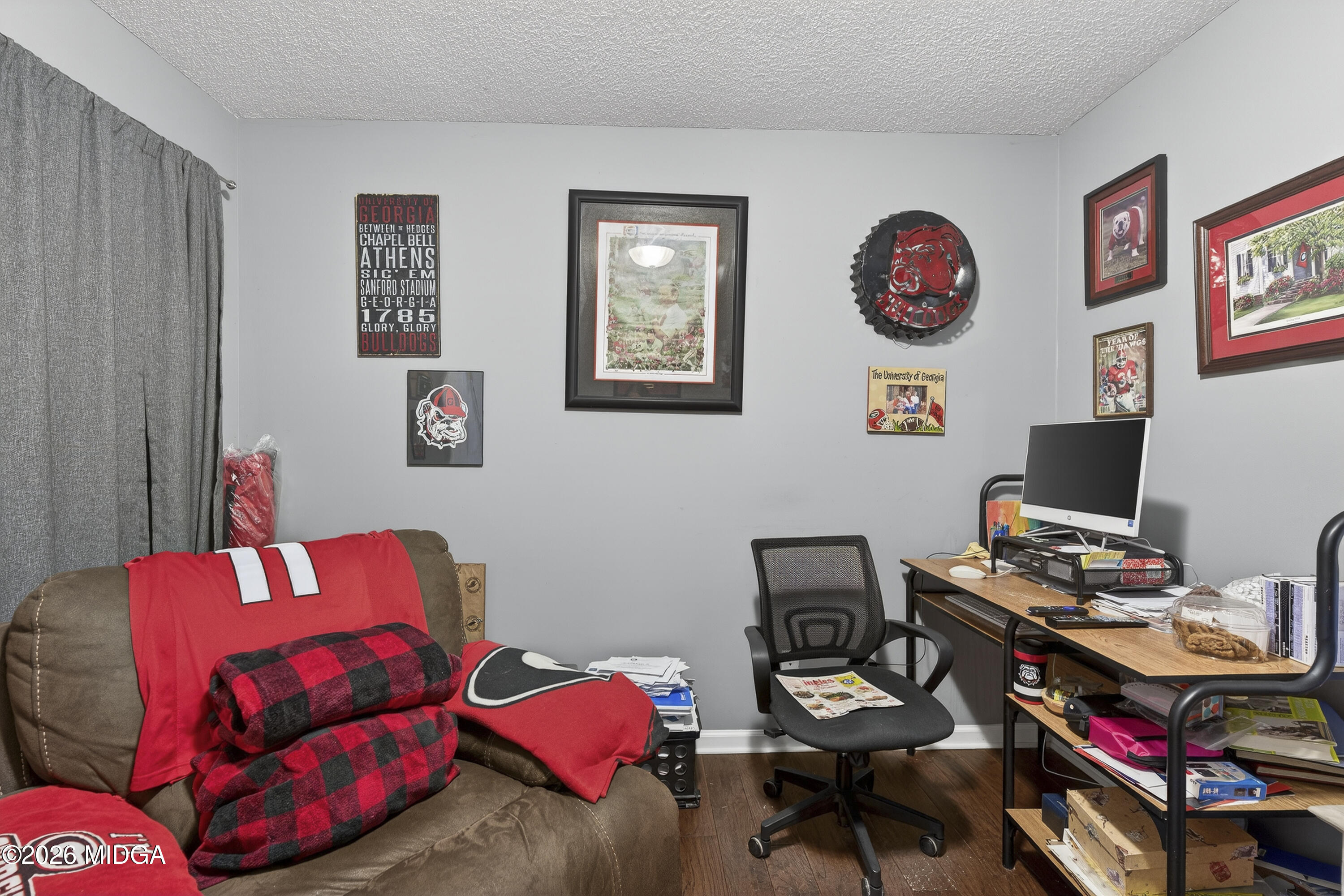 249 Southern Walk Circle Gray, GA 31032 - Photo 33 of 58 a bedroom with a bed and a chair