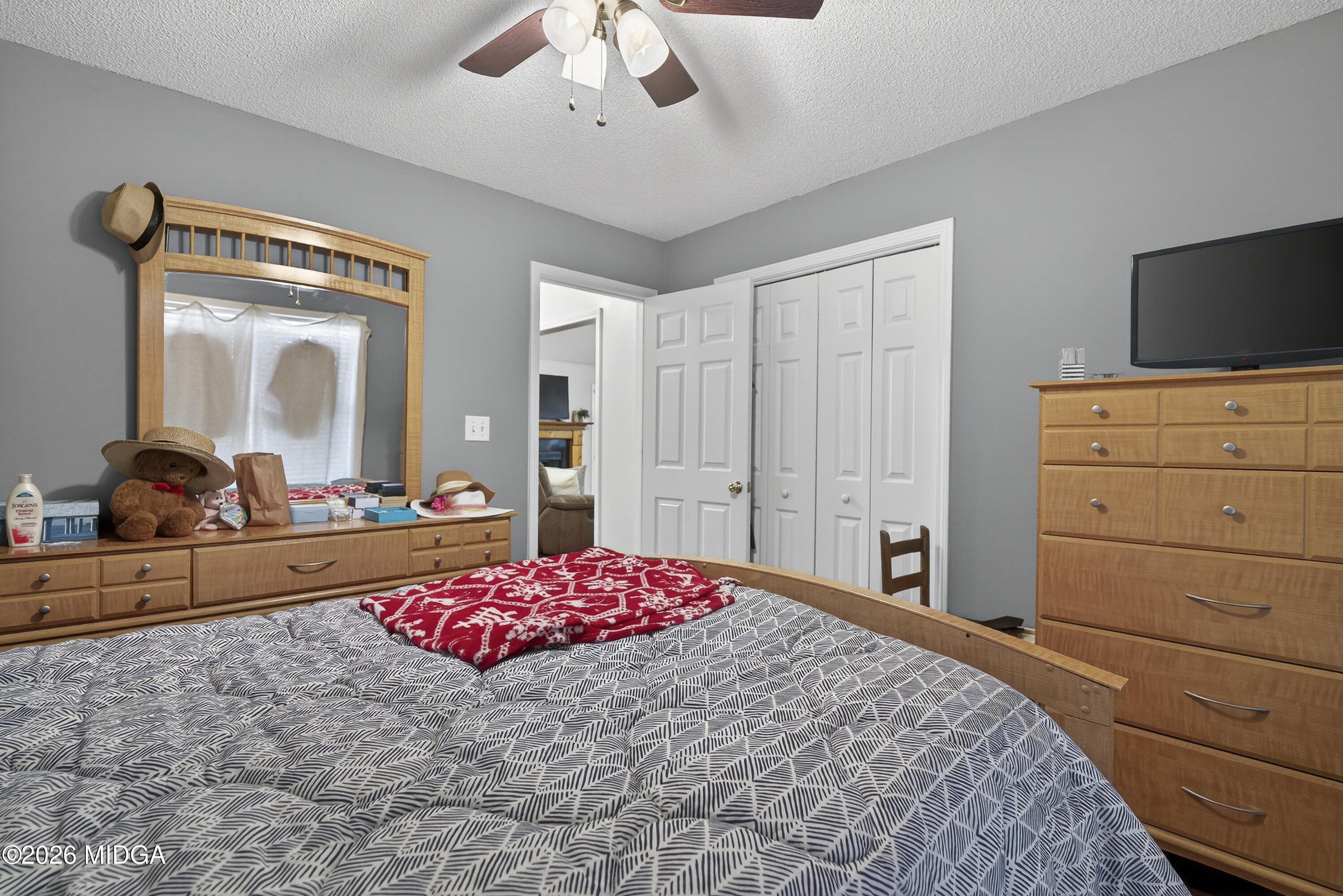 249 Southern Walk Circle Gray, GA 31032 - Photo 37 of 58 a bedroom with a bed and a dresser