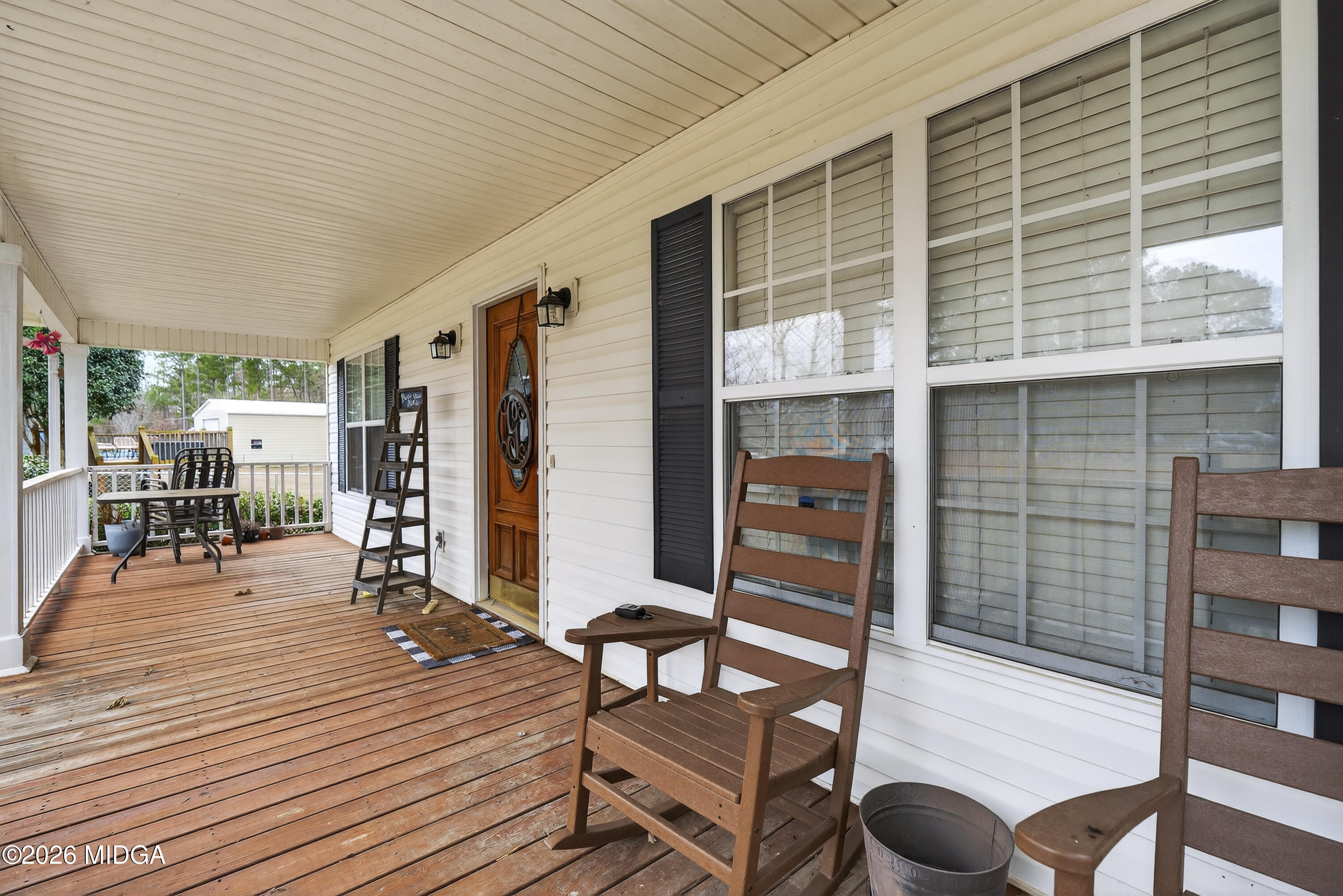 249 Southern Walk Circle Gray, GA 31032 - Photo 5 of 58 a outdoor space with lots of furniture and windows