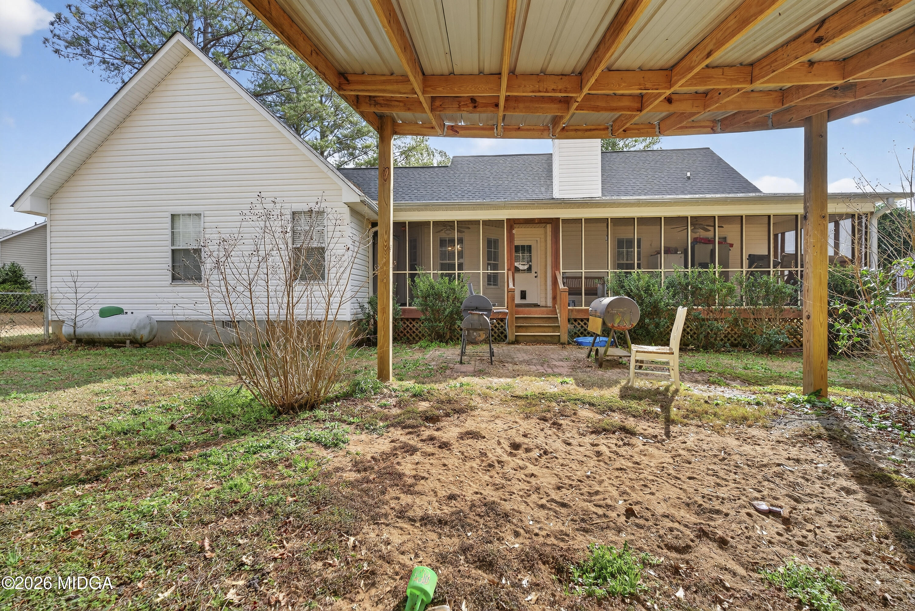 249 Southern Walk Circle Gray, GA 31032 - Photo 51 of 58 a view of a house with backyard and chairs