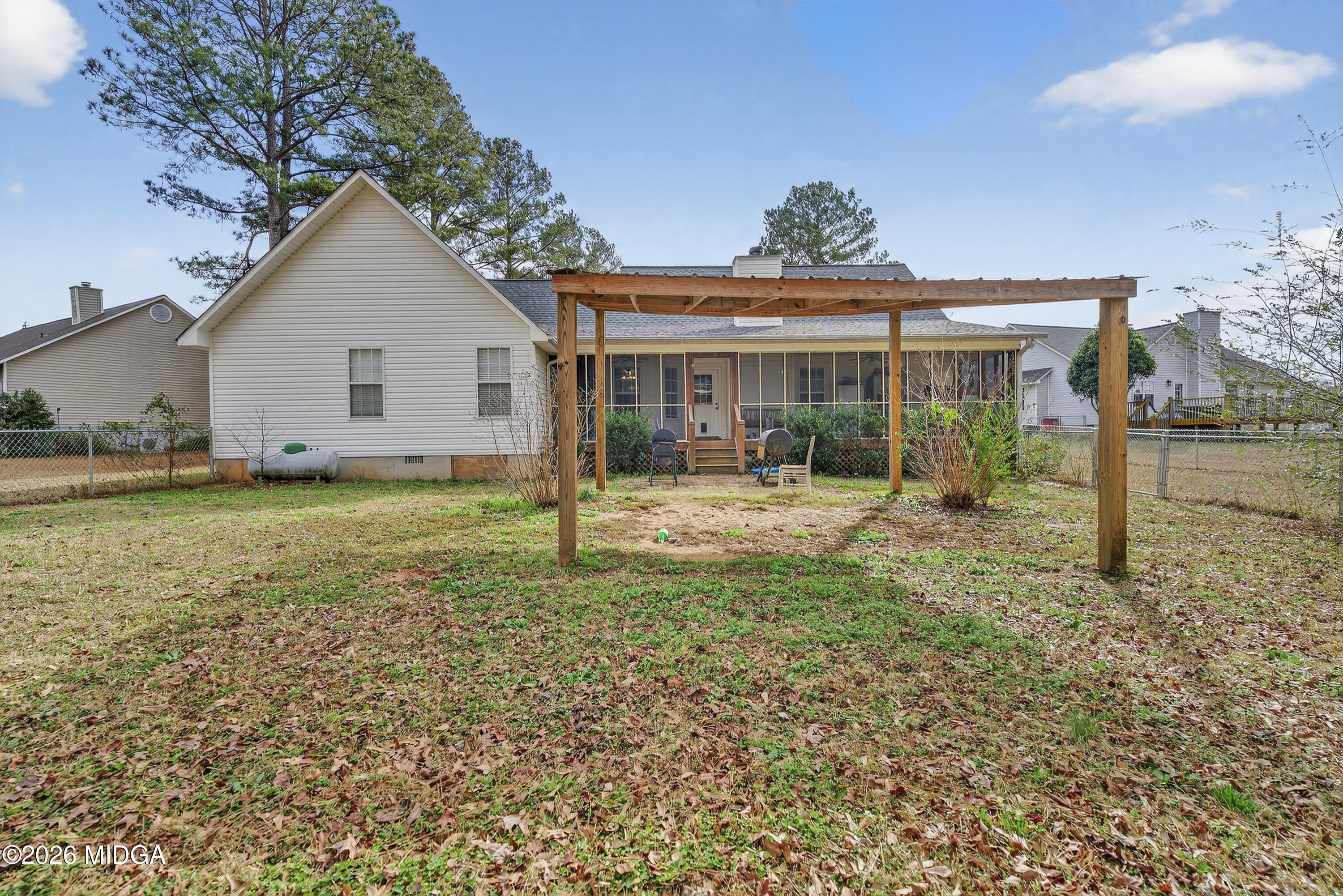 249 Southern Walk Circle Gray, GA 31032 - Photo 53 of 58 a view of a house with backyard and a garden