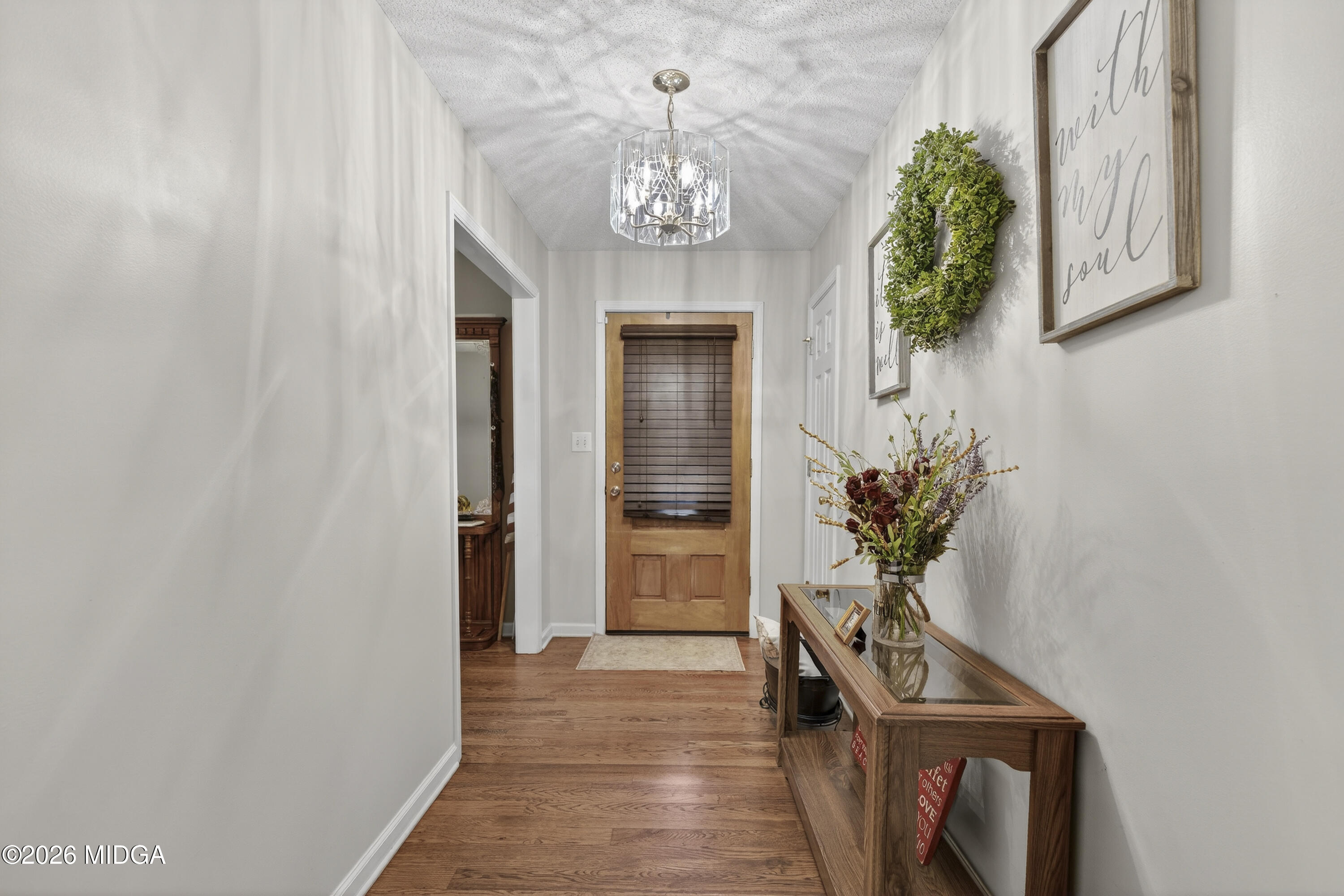 249 Southern Walk Circle Gray, GA 31032 - Photo 8 of 58 a view of an entryway with wooden floor