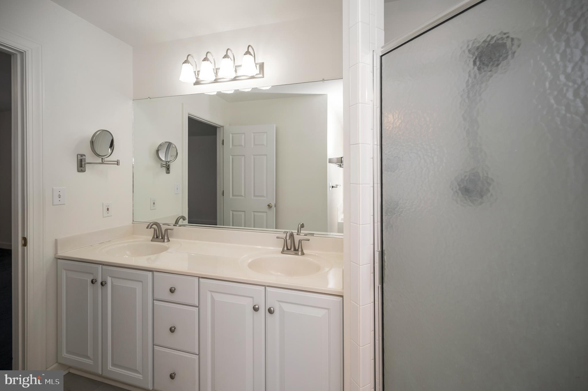 210 Saylers Creek Road Locust Grove, VA 22508 - Photo 21 of 46 Ensuite with double vanity and stall shower