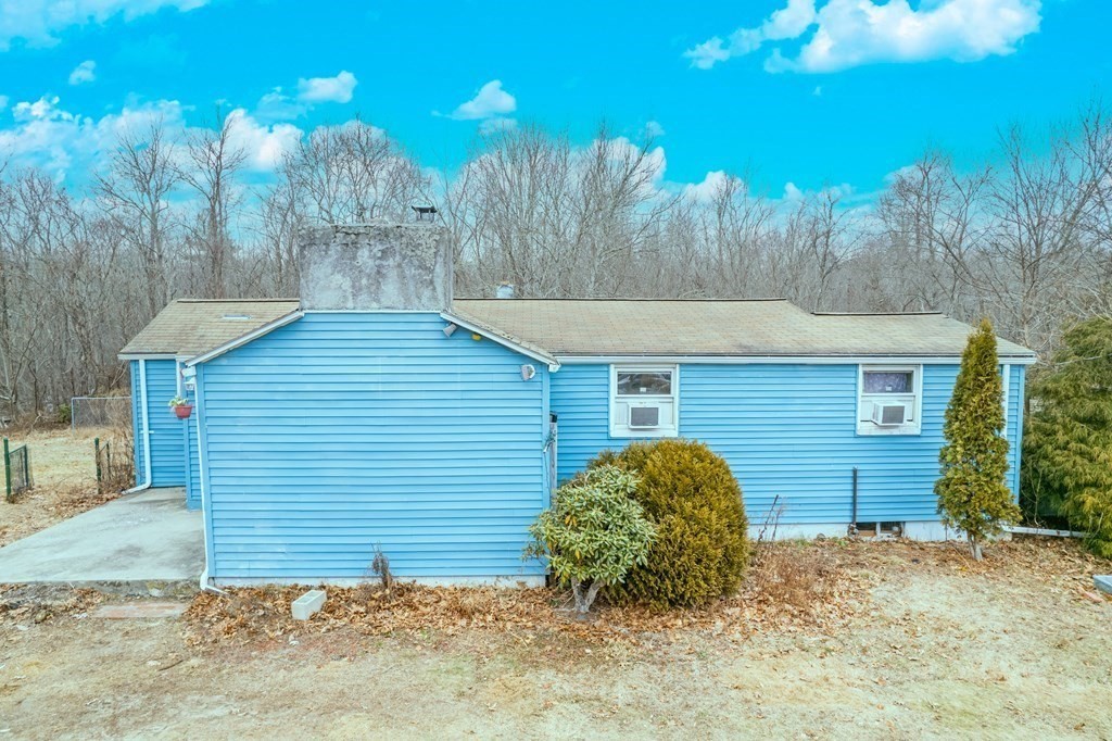 74 Winthrop Street Rehoboth, MA 02769 - Photo 4 of 8 a view of a house with a yard and large tree