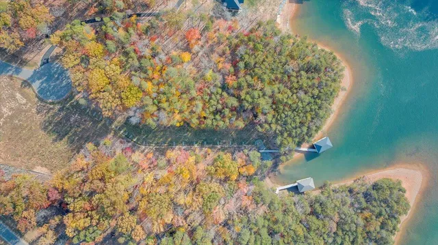 an aerial view of a houses with outdoor space