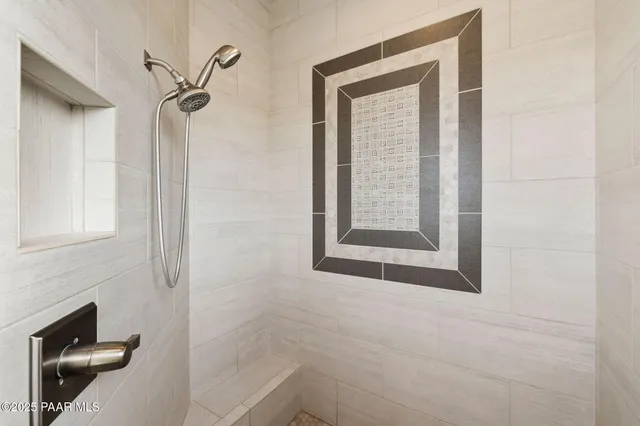 aerial view of a house with a mountain in the background