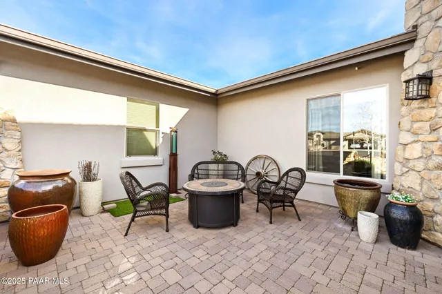 a outdoor seating area with furniture and outdoor space