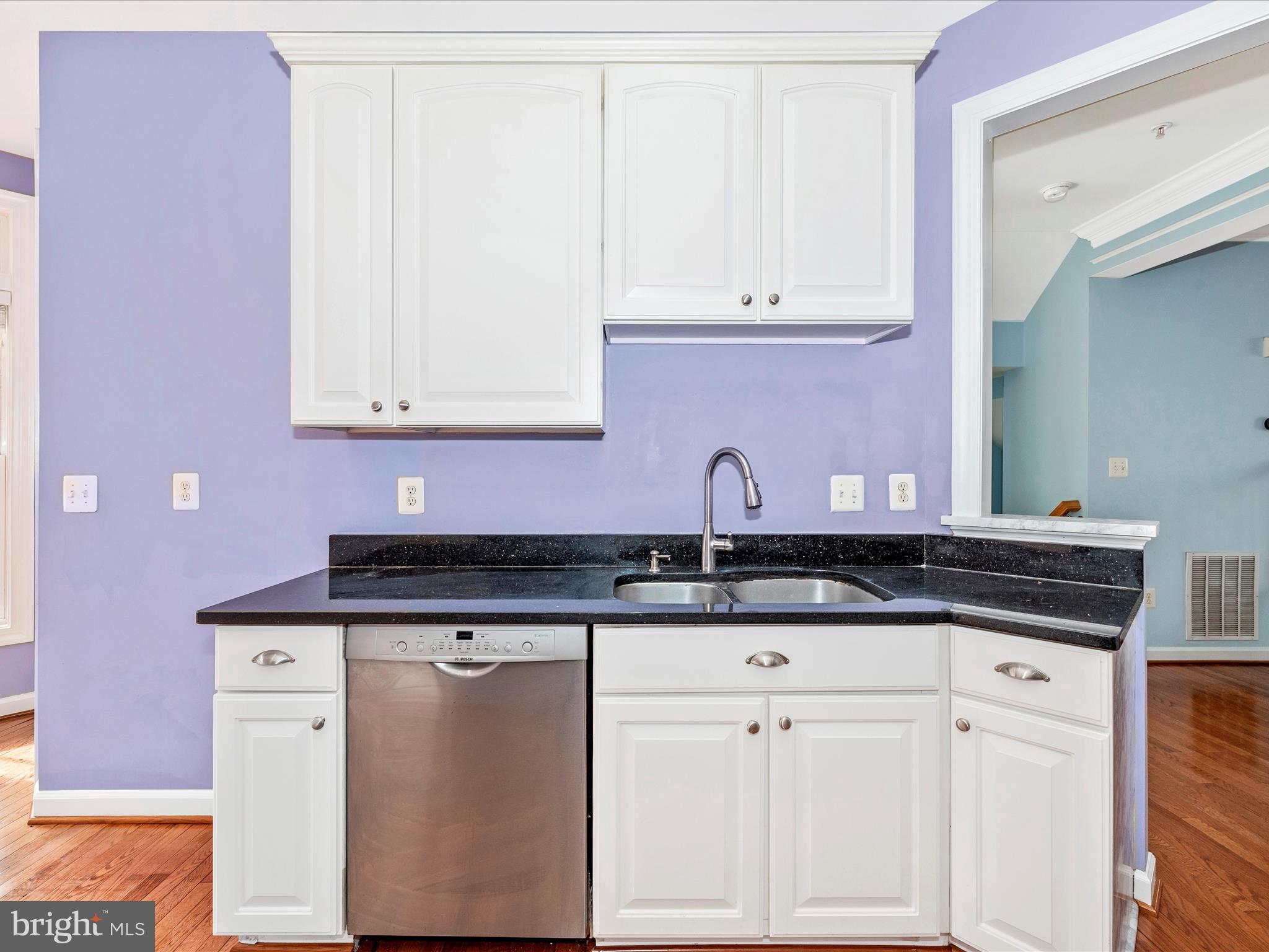 10811 Wadsworth Road Woodstock, MD 21163 - Photo 13 of 66 a kitchen with granite countertop a sink and cabinets