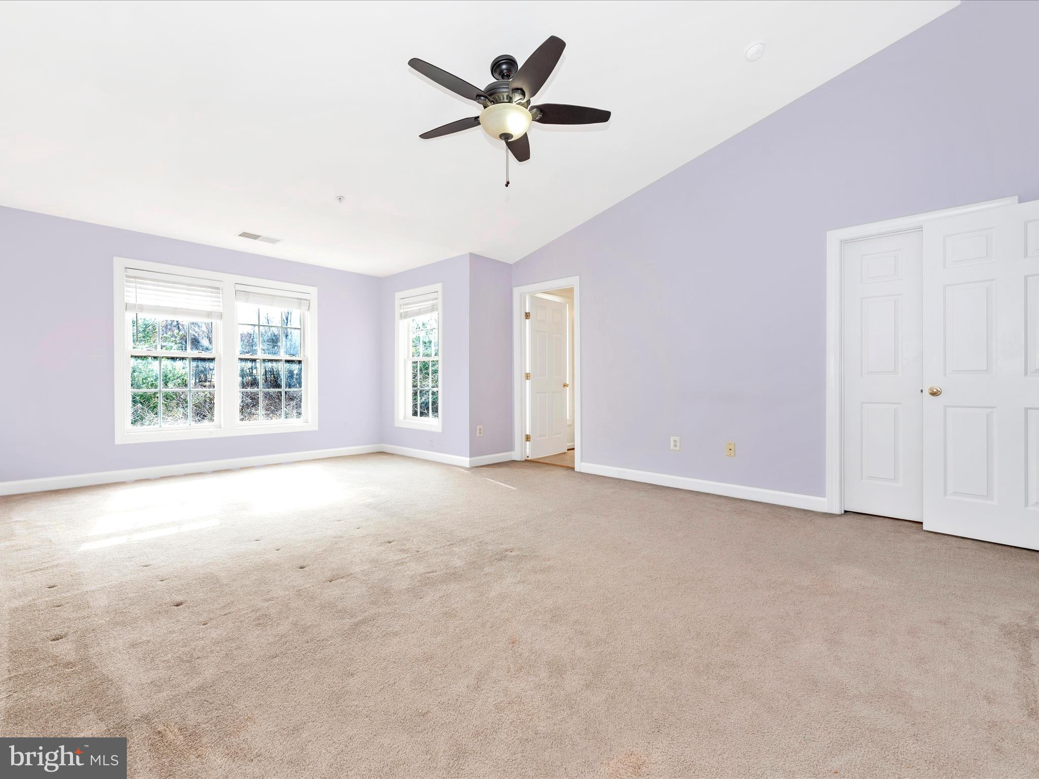 10811 Wadsworth Road Woodstock, MD 21163 - Photo 26 of 66 an empty room with a ceiling fan and window