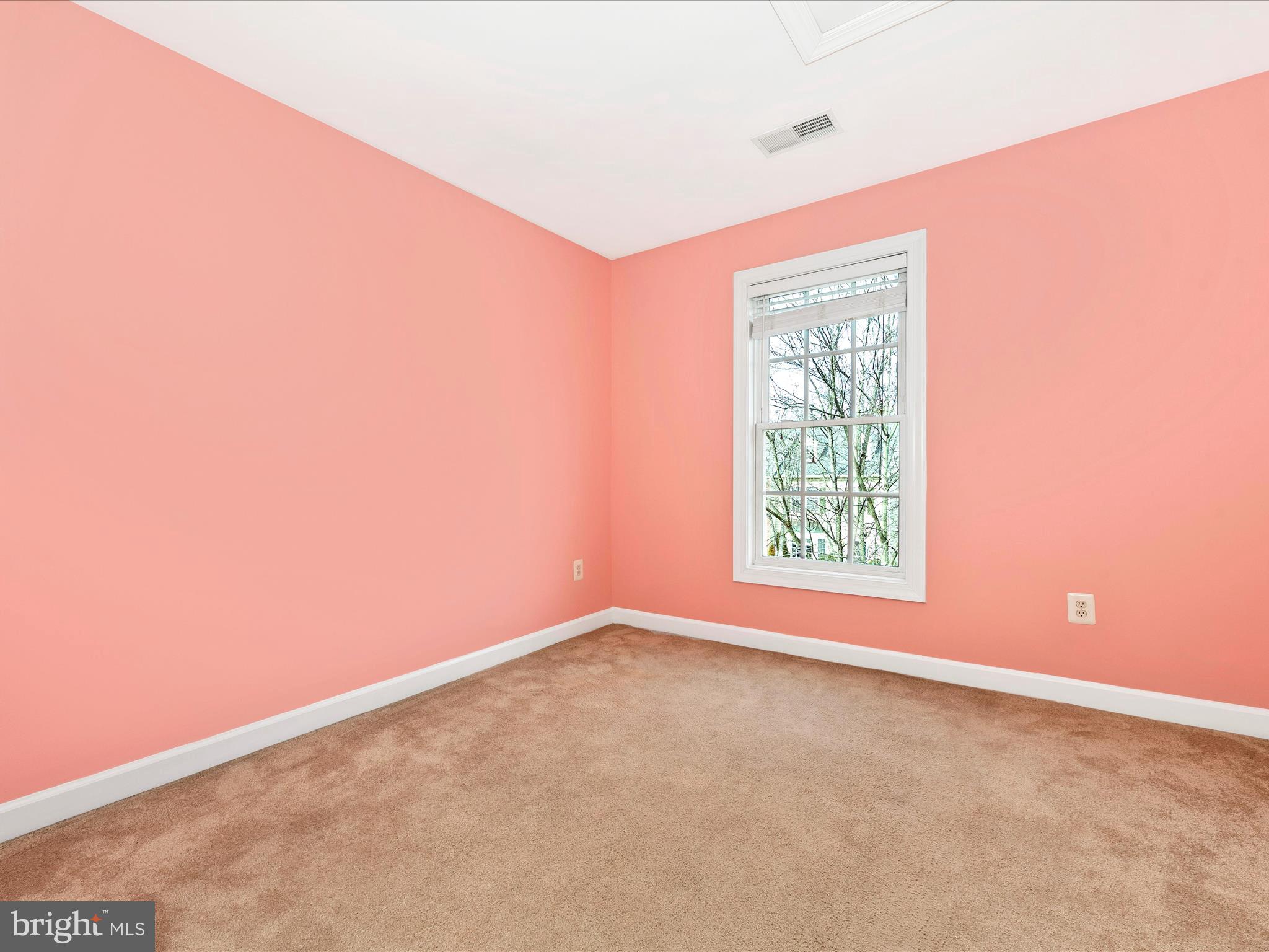 10811 Wadsworth Road Woodstock, MD 21163 - Photo 30 of 66 an empty room with a window