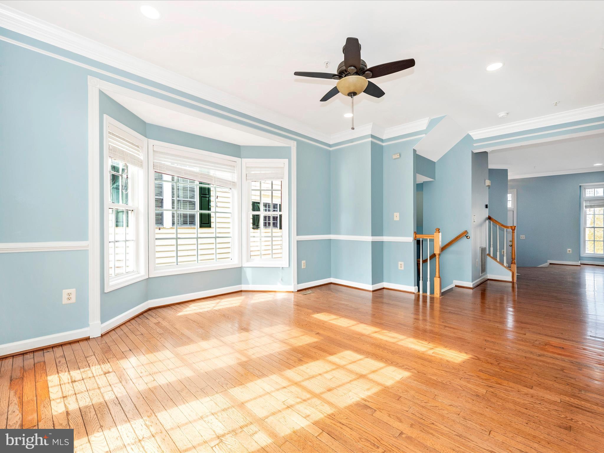 10811 Wadsworth Road Woodstock, MD 21163 - Photo 10 of 66 a view of an empty room with wooden floor and a window