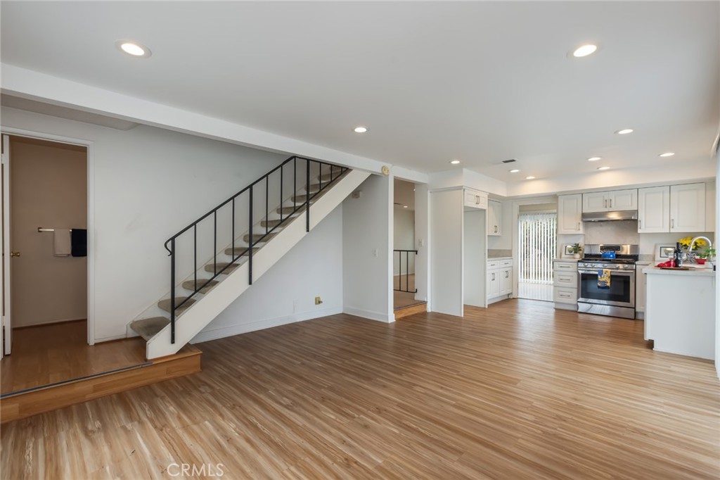 20233 Campaign Drive Carson, CA 90746 - Photo 17 of 44 a view of empty room with wooden floor