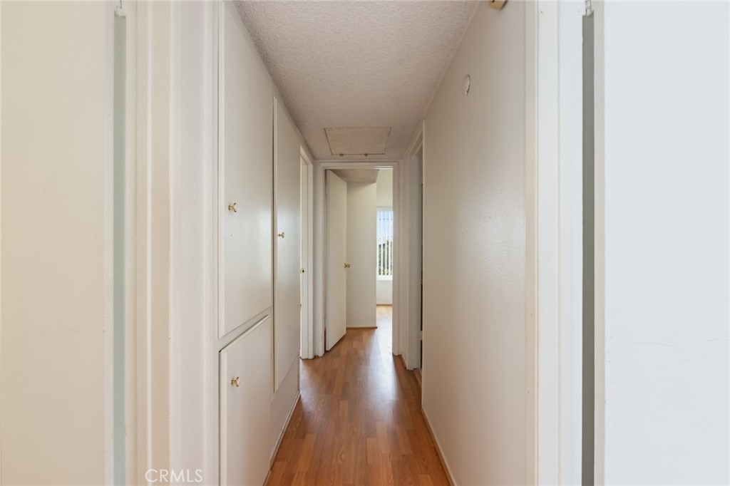 20233 Campaign Drive Carson, CA 90746 - Photo 21 of 44 a view of a hallway with wooden floor