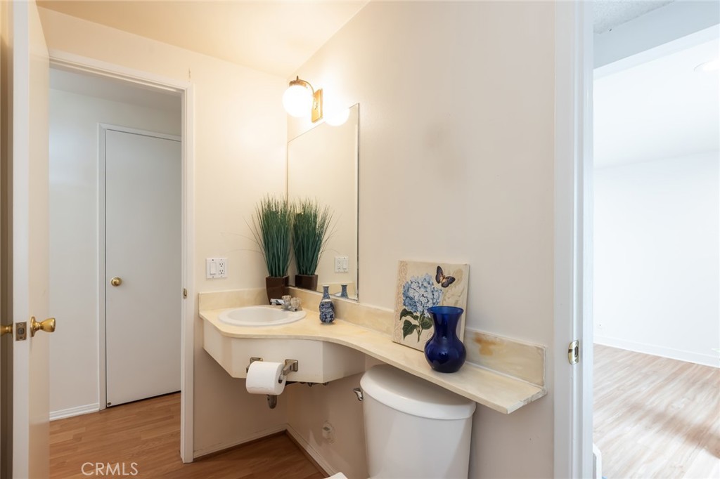 20233 Campaign Drive Carson, CA 90746 - Photo 37 of 44 a bathroom with a sink and a mirror