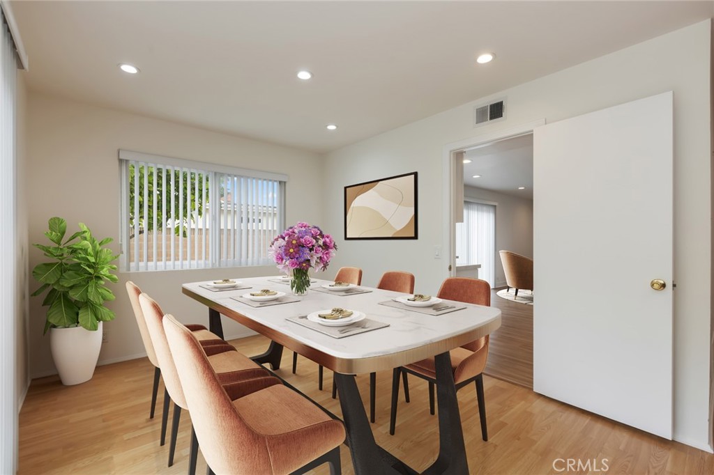 20233 Campaign Drive Carson, CA 90746 - Photo 9 of 44 a view of a dining room with furniture and wooden floor