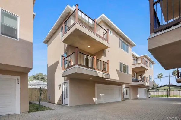 a front view of a house with a garage