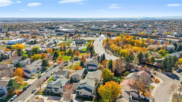 an aerial view of a city with lots of residential buildings