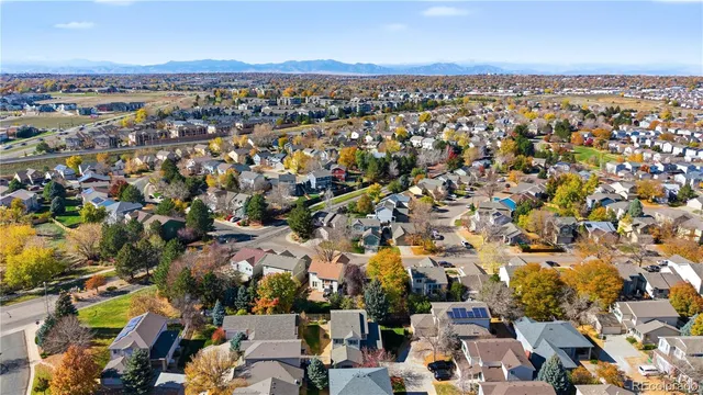 an aerial view of a city with lots of residential buildings