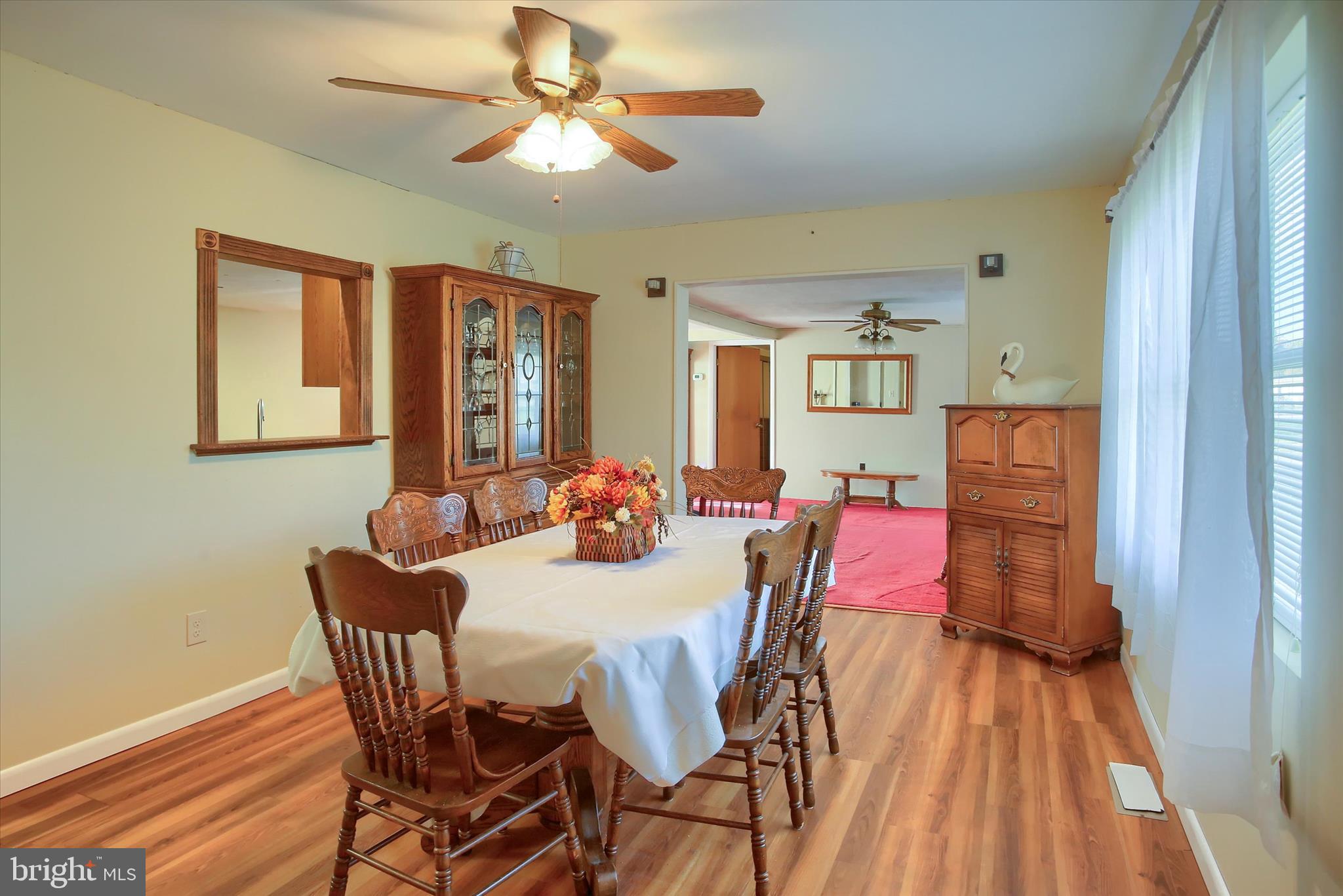 859 Pinetown Road Lewisberry, PA 17339 - Photo 12 of 51 a view of a dining room with furniture window and wooden floor