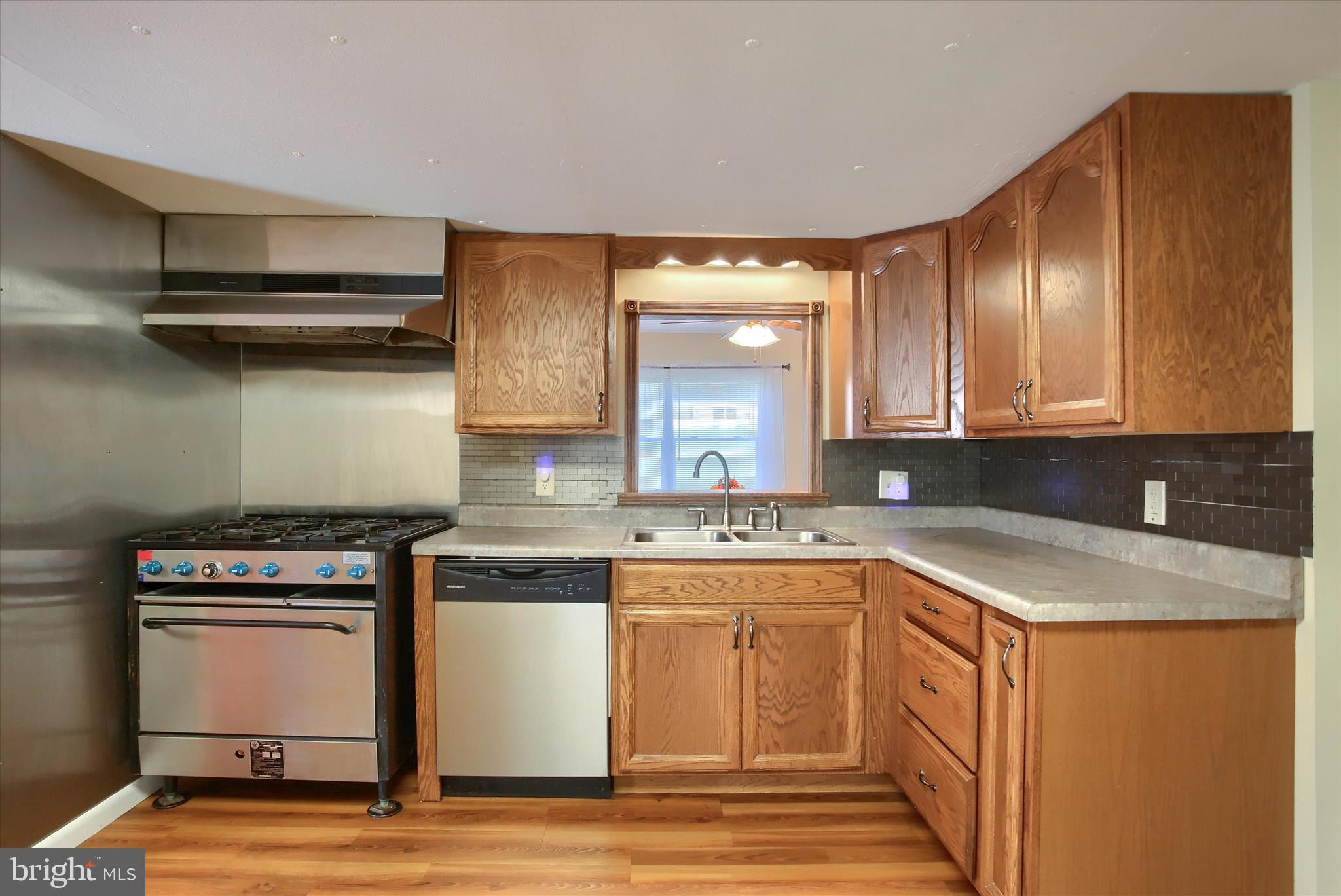 859 Pinetown Road Lewisberry, PA 17339 - Photo 17 of 51 a kitchen with a sink and cabinets