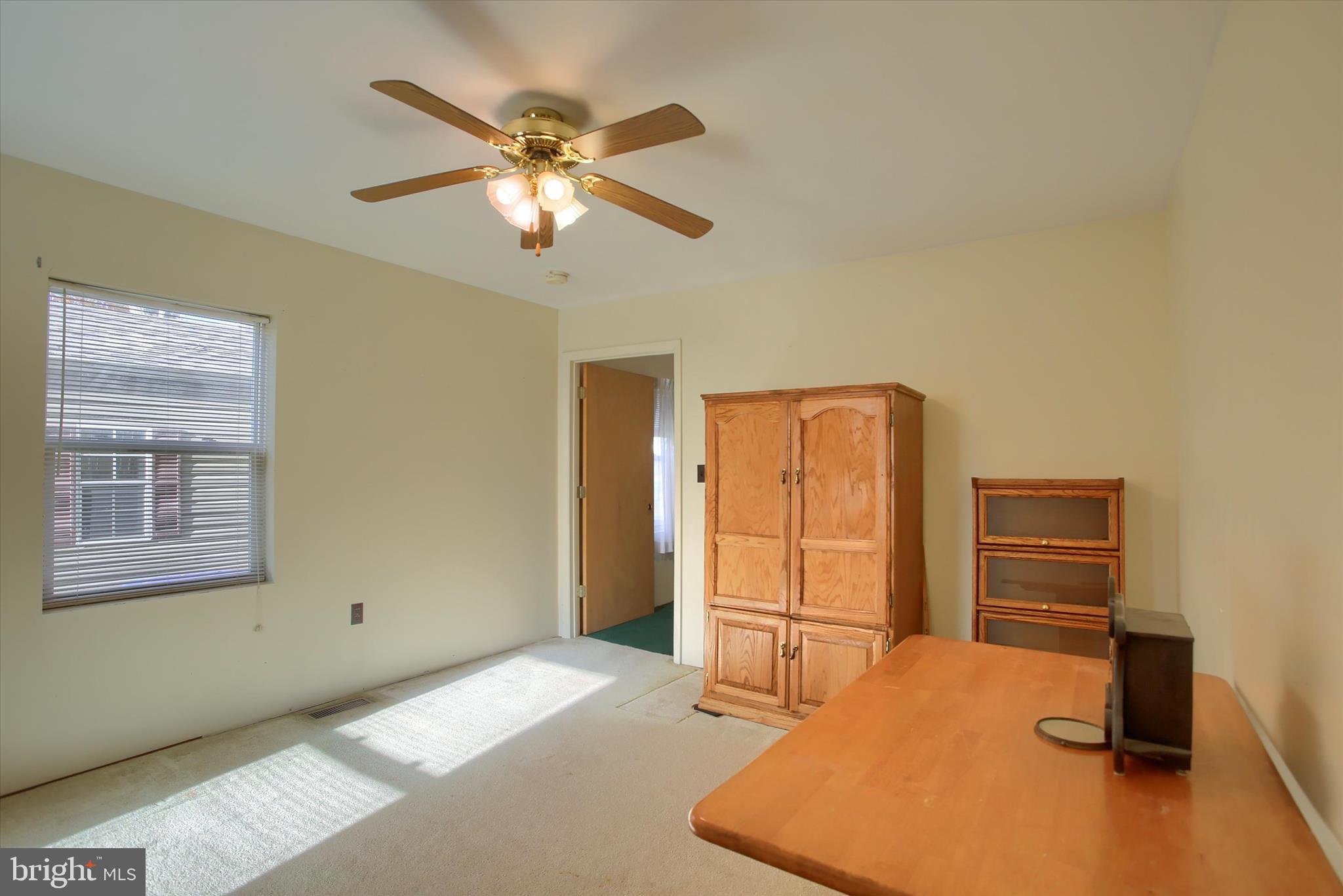 859 Pinetown Road Lewisberry, PA 17339 - Photo 29 of 51 a room with furniture and a window