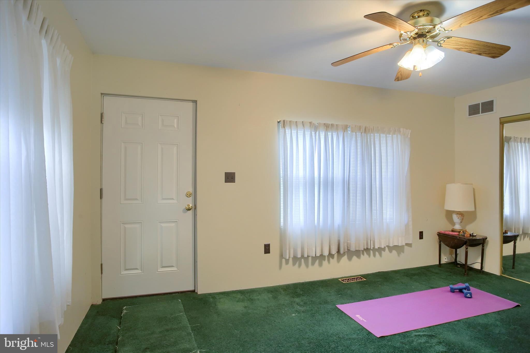 859 Pinetown Road Lewisberry, PA 17339 - Photo 33 of 51 a bedroom with a bed and a chandelier