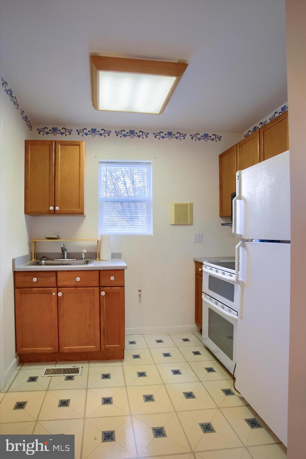 859 Pinetown Road Lewisberry, PA 17339 - Photo 39 of 51 a room with a dresser and a refrigerator