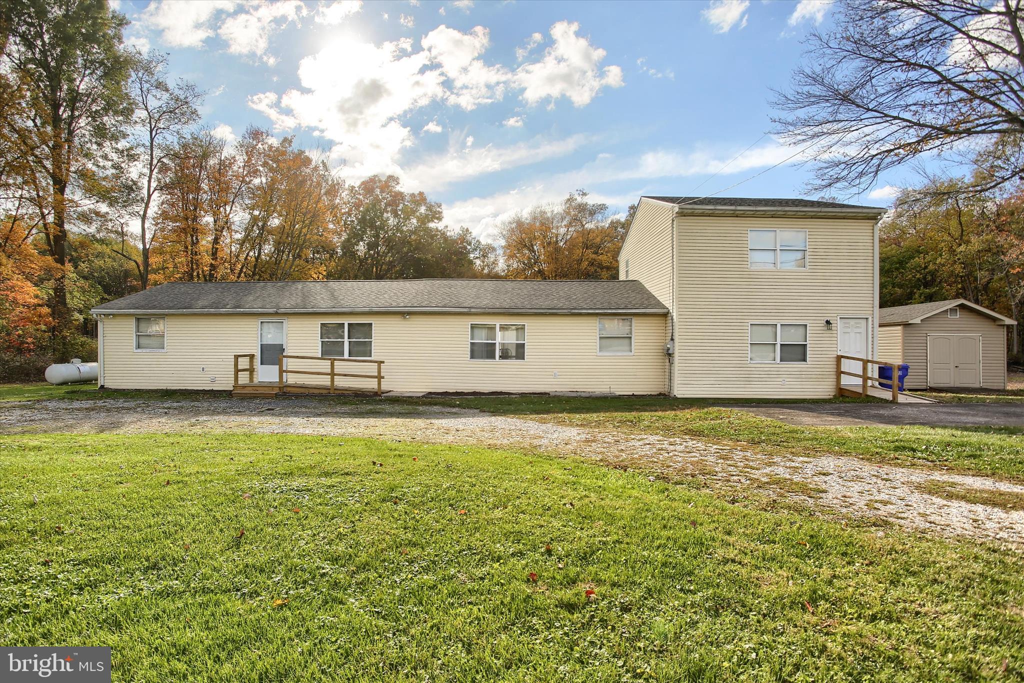 859 Pinetown Road Lewisberry, PA 17339 - Photo 44 of 51 a view of a big house with a big yard