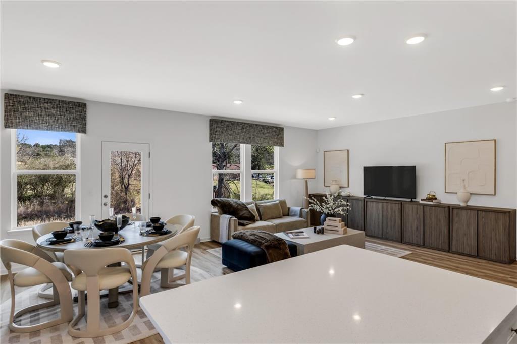 163 Sweet Water Lane Rome, GA 30161 - Photo 15 of 28 a living room with furniture and a flat screen tv