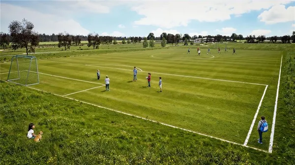 swimming pool view with a seating space