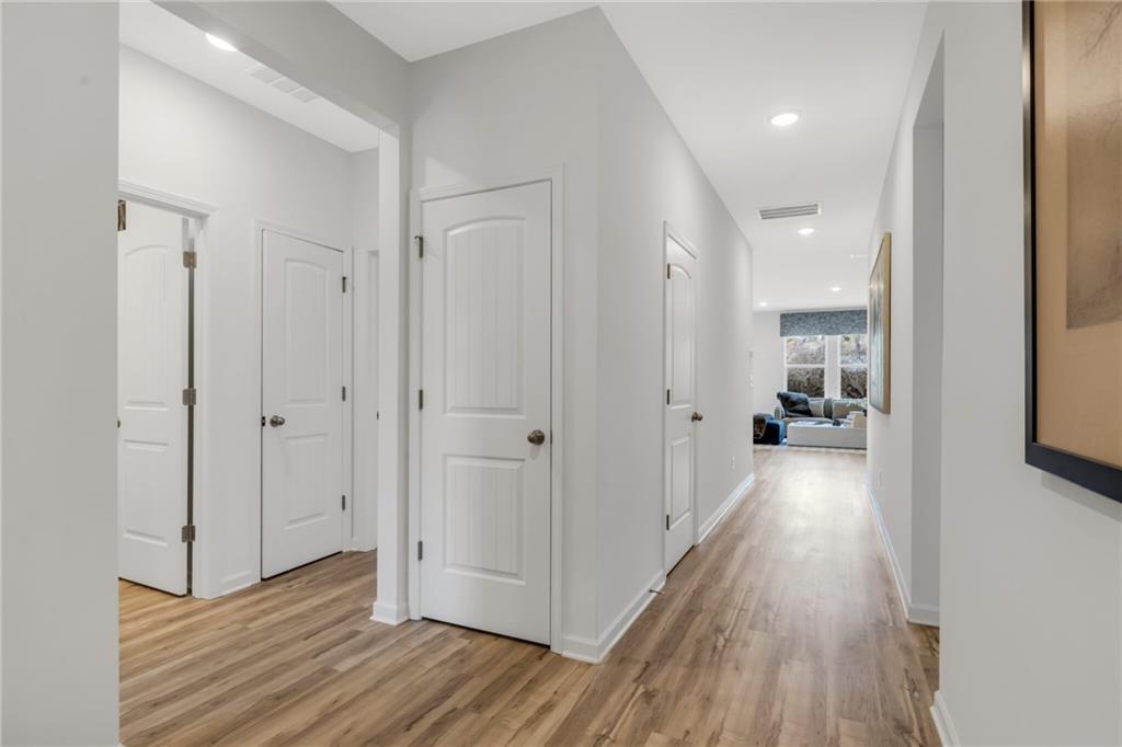 163 Sweet Water Lane Rome, GA 30161 - Photo 3 of 28 a view of a hallway with wooden floor