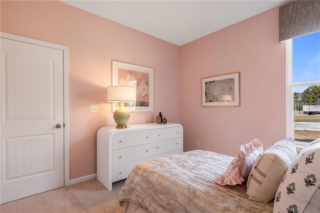 163 Sweet Water Lane Rome, GA 30161 - Photo 7 of 28 a bedroom with a bed and a window