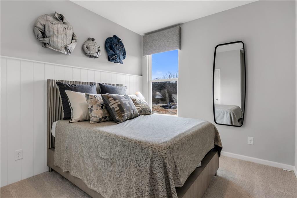 163 Sweet Water Lane Rome, GA 30161 - Photo 9 of 28 a bedroom with a bed and painting on the wall