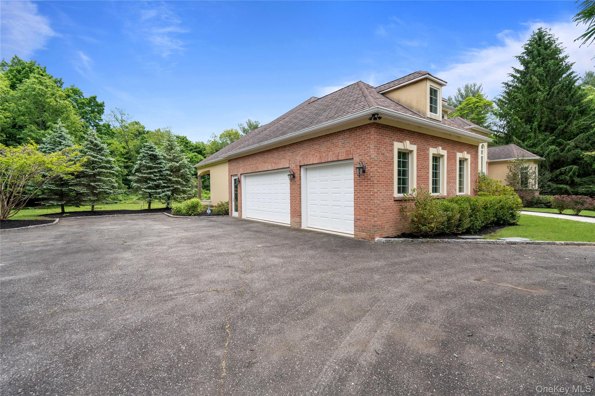 1960 Midlane Road South Syosset, NY 11791 - Photo 3 of 46 a front view of a house with a yard