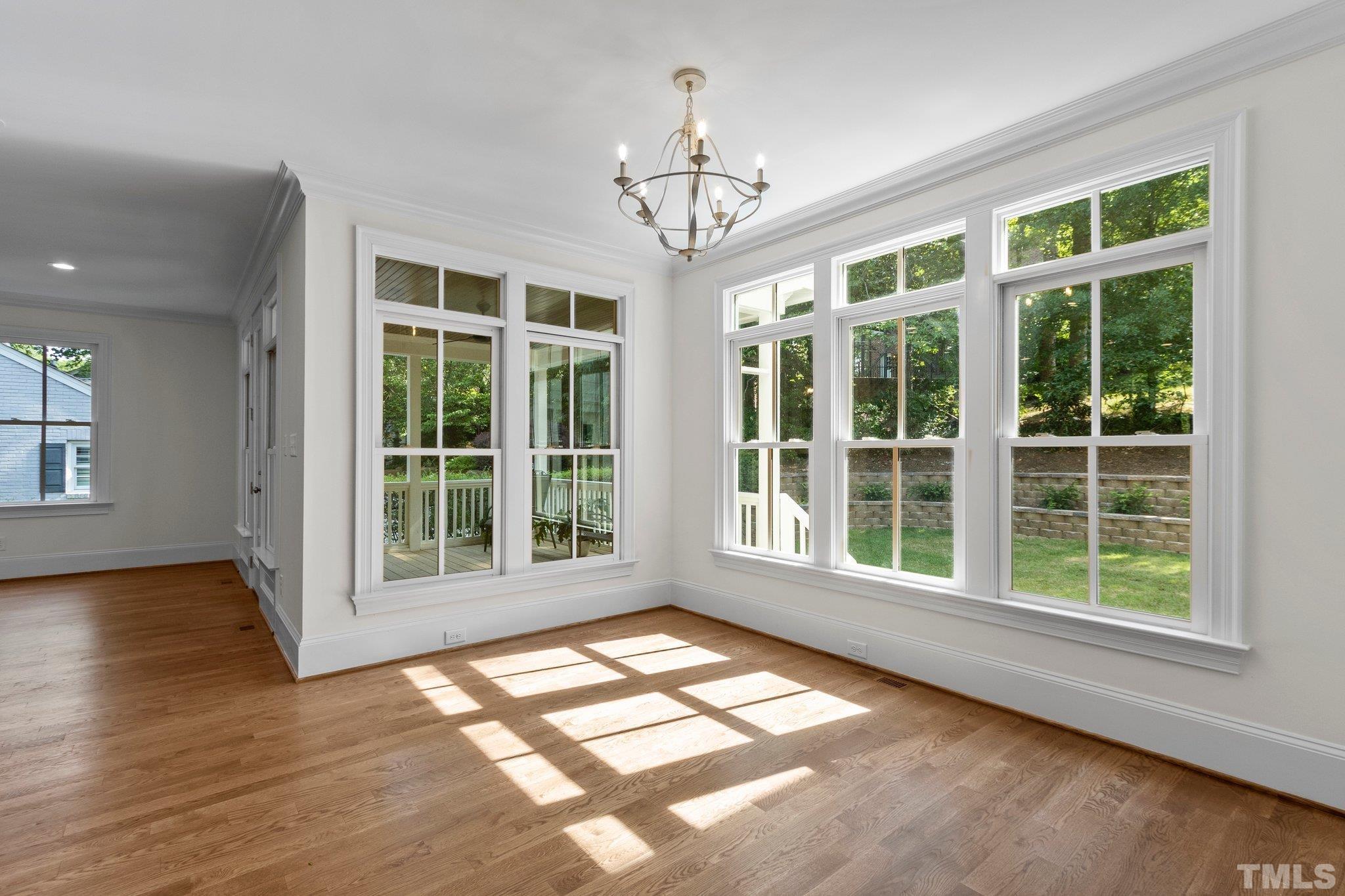 1500 Banbury Road Raleigh, NC 27607 - Photo 13 of 39 a view of an empty room with a window